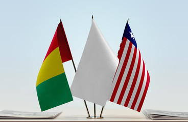 Flags of Guinea and Liberia with a white flag in the middle