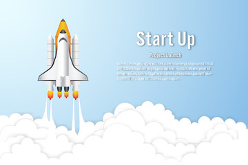 Rocket launch on the clouds and blue sky as paper art, craft style and business Startup project concept. flat design vector illustration.