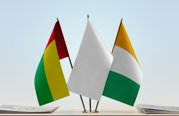 Flags of Guinea-Bissau and Ivory Coast with a white flag in the middle