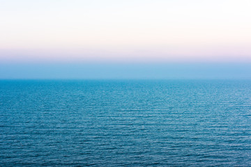 Obraz premium Clouds over sea