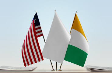 Flags of Liberia and Ivory Coast with a white flag in the middle