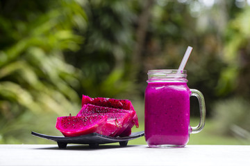 Fresh smoothies from a dragon fruit, banana, mango and papaya. Island Bali, Ubud, Indonesia