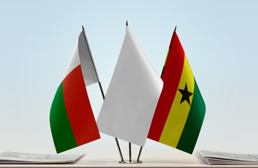 Flags of Madagascar and Ghana with a white flag in the middle