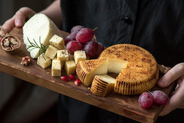 cheese platter in hands