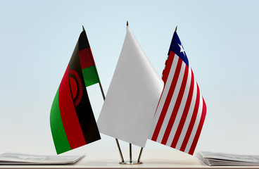 Flags of Malawi and Liberia with a white flag in the middle