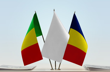 Flags of Mali and Chad with a white flag in the middle