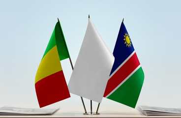 Flags of Mali and Namibia with a white flag in the middle