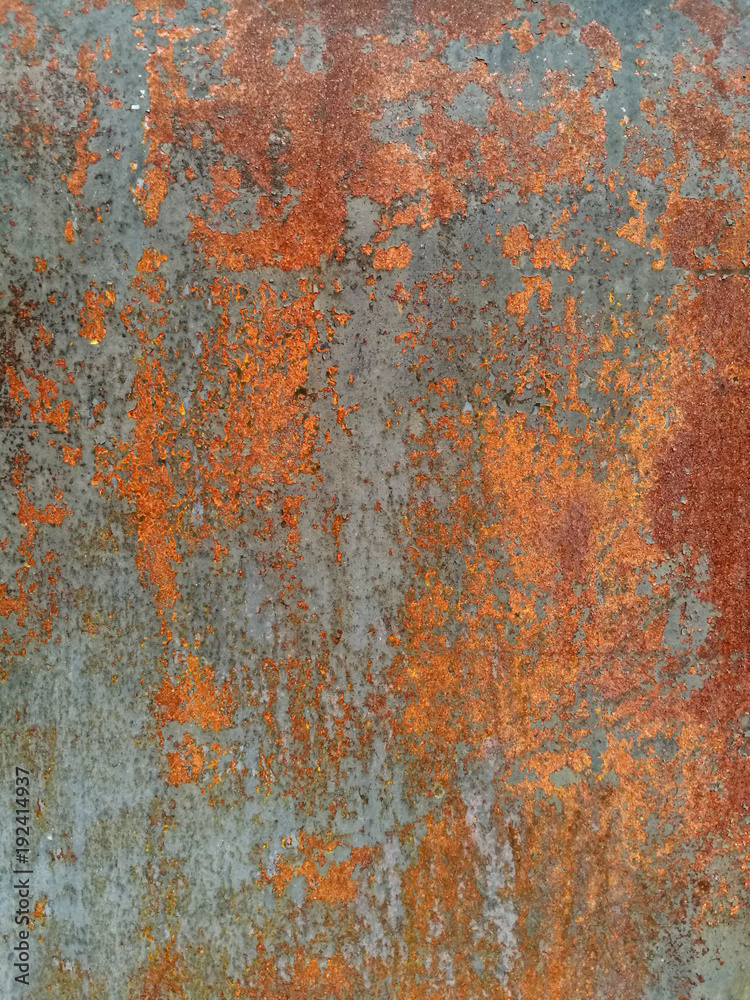 Wall mural rust on metal surface covered with paint