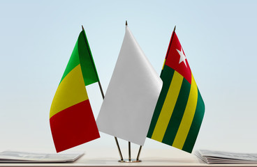 Flags of Mali and Togo with a white flag in the middle