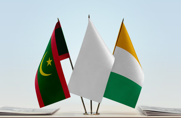 Flags of Mauritania and Ivory Coast with a white flag in the middle