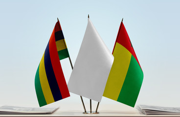 Flags of Mauritius and Guinea-Bissau with a white flag in the middle