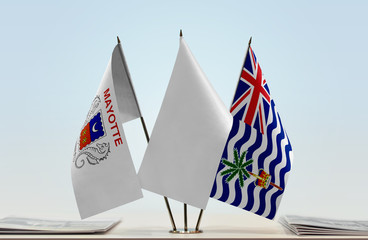 Flags of Mayotte and British Indian Ocean Territory with a white flag in the middle