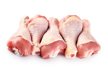 Raw chicken legs isolated on white background.
