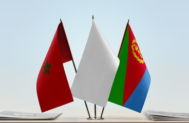 Fototapeta na wymiar Flags of Morocco and Eritrea with a white flag in the middle