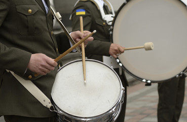 Fototapeta na wymiar Military orchestra musician’s hand’s playing drums