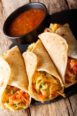 Frankies are also known as Kathi Rolls popular Mumbai street food close-up. Vertical