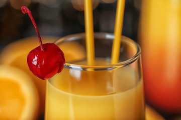 Glass with cocktail Sex on the Beach, closeup