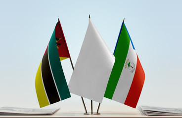 Flags of Mozambique and Equatorial Guinea with a white flag in the middle