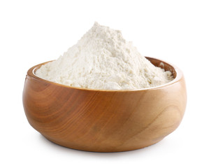 Bowl with flour on white background