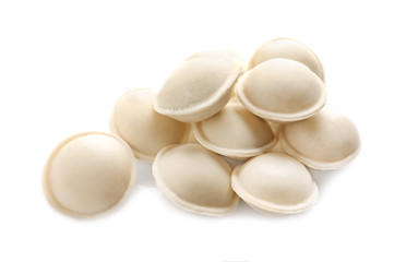Raw dumplings on white background