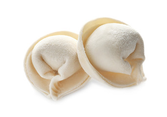 Raw dumplings on white background