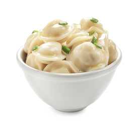 Bowl with tasty dumplings on white background