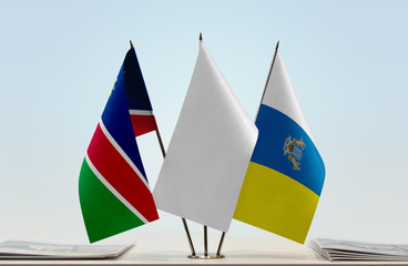 Flags of Namibia and Canary Islands with a white flag in the middle