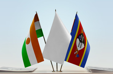 Flags of Niger and Swaziland with a white flag in the middle