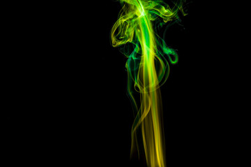 Colored smoke on black background