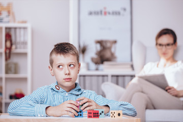 Boy playing with dice