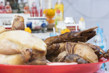 Steamed chicken and duck offering to spirits