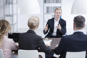 Young businessman and management team