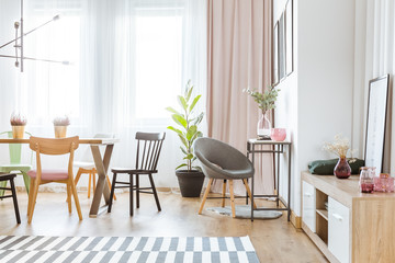 Gray armchair in dining room