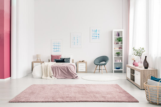 Pink spacious bedroom interior