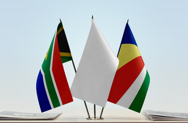 Flags of Republic of South Africa and Seychelles with a white flag in the middle