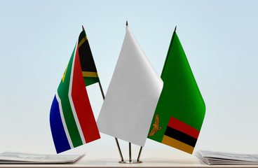 Flags of Republic of South Africa and Zambia with a white flag in the middle