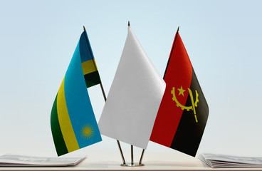 Flags of Rwanda and Angola with a white flag in the middle