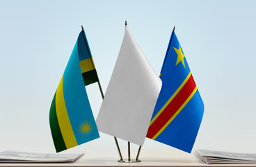 Flags of Rwanda and Democratic Republic of the Congo (DRC, DROC, Congo-Kinshasa) with a white flag in the middle
