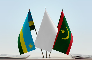 Flags of Rwanda and Mauritania with a white flag in the middle