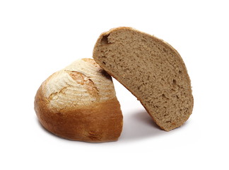Loaf of wheat bread sliced in half isolated on white background