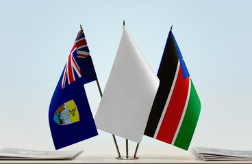 Flags of Saint Helena and South Sudan with a white flag in the middle