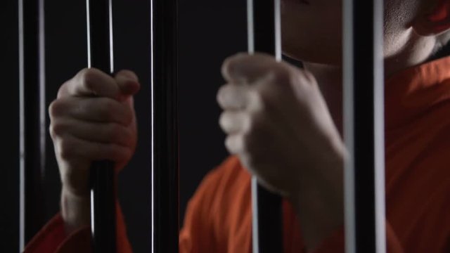 Suspect in jail awaiting trial, impatient and nervous, hopes to avoid punishment