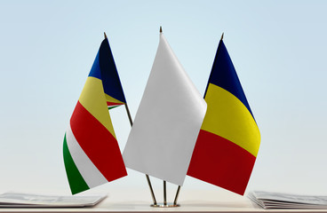 Flags of Seychelles and Chad with a white flag in the middle