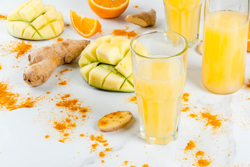Indian cuisine recipes. Healthy food, detox water. Traditional Indian mango, orange, turmeric and...