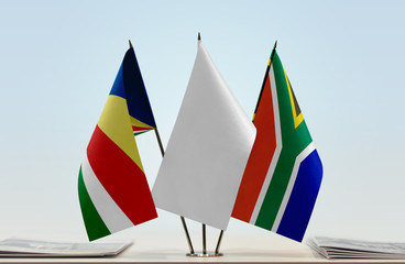 Flags of Seychelles and Republic of South Africa with a white flag in the middle