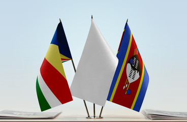 Flags of Seychelles and Swaziland with a white flag in the middle
