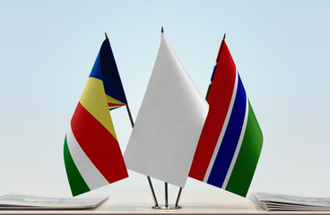 Flags of Seychelles and The Gambia with a white flag in the middle