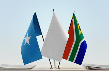 Flags of Somalia and Republic of South Africa with a white flag in the middle