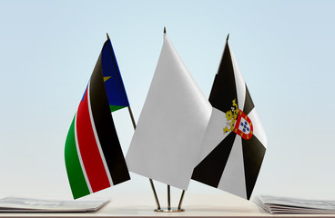 Flags of South Sudan and Ceuta with a white flag in the middle