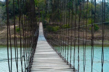 Beautiful wooden bridge on the river.
